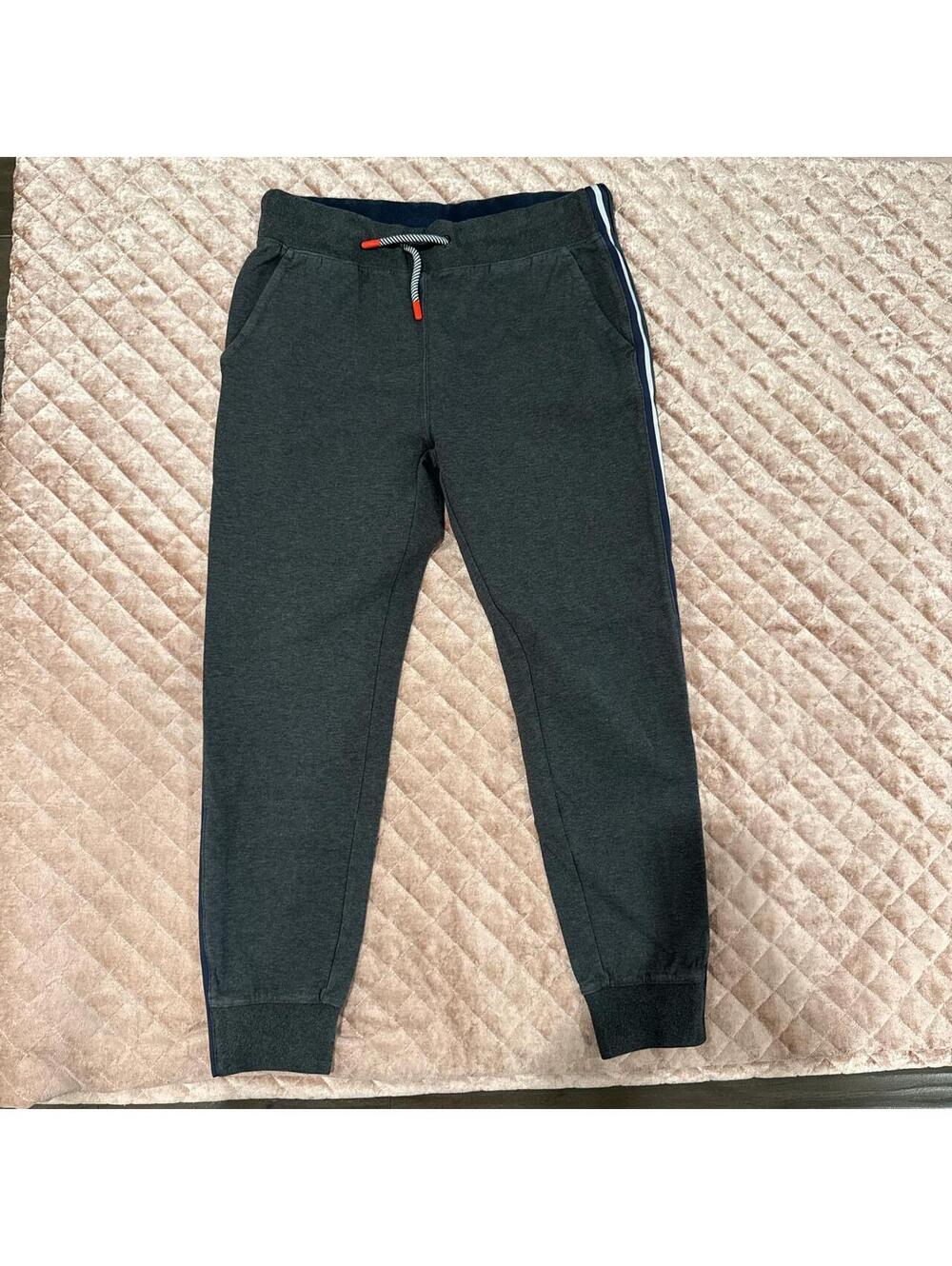 PSYCHO BUNNY men's Grey joggers with white and navy stripe down each leg.